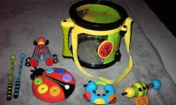 Parent 'Bee Bob Drum set' - (retails for $25.00) $10
- all the instruments fit inside the drum for easy storage. - SOLD
 
Backyardigans Sing 'N Strum Guitar by Fisher Price - (retails for $30) - $8
 
Little Tikes Jungle Jamboree Tiger Xylophone/Piano