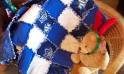 This adorable rag quilt is perfect for that up and coming hockey fan.
Measures 29"x29" and is all flannel.
White, Blue and the Toronto Maple Leaf squares.