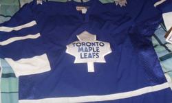 I have a men's Toronto Maple Leafs Jersey for sale. I bought it for my husband for Christmas and he has lost weight. I want to buy him a smaller one. It is brand new with tags and a size XL. Asking $50 firm. This is what I paid for it. Please call