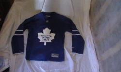 Worn once, Reebok Official Toronto Maple Leafs Women's Jersey.
please see my other ads.