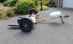 Tow Dolly in excellent condition, equipped with wheel straps and spare wheel.