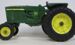Up for sale is a used toy 3010 diesel tractor 1:16 scale 1992 collectors ed. 1992 Special Edition is stamped on tractor. Item has been played with, missing exhaust pipe. Paint is scratched and chipped as shown in pictures. Still a nice toy with metal
