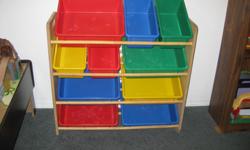 Excellent used condition! Excellent for organizing and storing toys. Comes with multi-coloured bins. Worked great for storing kids kitchen toys, play food, blocks, baby toys, little people and miscellaneous items as well.