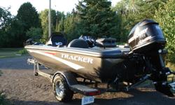 2007 Tracker Avalanche, 18.5' with 115 OPT Mercury Motor and Tracker Marine Trailer. Fish finder, Trolling Motor and Safety equipment included. Boat and Trailer like new, never used, only 14 hours on boat. $18,000 firm.