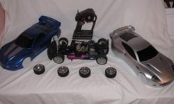 Traxxas 4-tec pro. All wheel drive. Tons of carbon fiber, light-weight and super strong. This car will do 60 MPH!! Complete parts car included (disassembled) and many more parts. 2 bodies, Tras-am, Astin Martin. Shown with original radio and .15 engine.