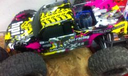 Mint condition traxxas 3.3 nitro REVO with reverse and easy start. Whole truck just had complete teardown and rebuild. Many new and upgraded parts (reverse servo, easy start system, air filter, gears, clutch etc.) needs a winter tuning. contact for more