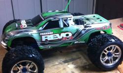 Pretty much brand new Revo 3.3 Has only had 2 tanks of fuel through it. Comes with 2 custom bodies, Ez start, brand new gallon of fuel, battery pack, filler bottle, tools and radio. These are the best nitro trucks you can buy and they do over 45mph and