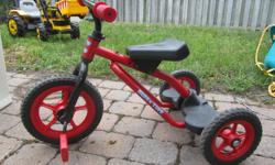 Red trike. Great for boys or girls. Great condition.