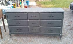 Triple black dresser with mirror needs painting it is white underneath the black call 613-966-1740 or come to 455 Cannifton rd n closed Tue. open other days 11:00 to 5:00 Sun. 12:00 to 4:30