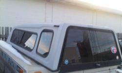 Fits GM TRUCK LONG BOX, 1988 - 1998, SLIDING GLASS WINDOWS IN FRONT AND SIDES, GOOD CONDITION
CALL 403 540 6400