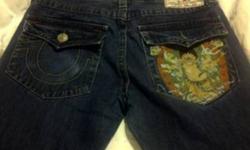 Men'a size 34 True Religion Jeans for sale. In great shape just missing button on one back pocket. Asking $30.00