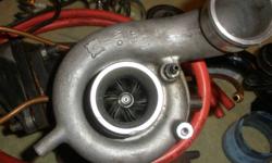 Turbo kit with manifold that fits a d16 1.6l Honda Civic engine. Will fit 92-00 civic.
Used condition, excellent shape. Turbo kit has a hx manifold bolted up to a garret t25 turbo that is in perfect condition. No shaft play & turbo spins freely. Kit comes