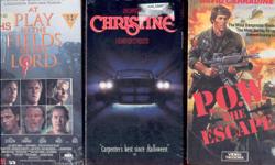 These are 24 VHS tapes - all for $15.00. Three are still sealed - Christine, P.O.W. The Escape, and At Play in the Fields of the Lord. Movies include Titanic, Misery, Armageddon, The Chase, Enemy of the State, Look Who's Talking Too, Motorama, and more.