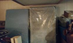 we have a twin box spring(still in plastic) foam matress(never used) metal frame and wood head board. we are asking 200 obo. must pick up and won't hold. if you want it has to be picked up asap email or call me at 306-520-2551.