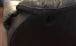 Two Dark brown leather reclining sofas. A bit worn as you see, smoke & pet free home.