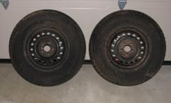 Two Arctic Claw snow tires with rims for sale.  They have only been used for one season.  We replaced our vehicle and these do not fit on our new one.
