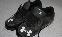 Boys size 4.5 under armour baseball cleats, only used one season.