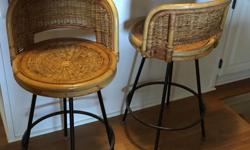 Very cool retro like bar stool, solid metal base with a well built wicker & bamboo seat that swivels, won't see these around anyone else's house.
Metal legs can use a refinish if you don't want the custom worn look ;-)
The seat is 24.5" and the back is