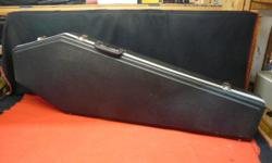 Very nice condition The coffin case for electric guitars, inventory #136870-18. Case will fit most electric guitars such as Les Paul, Strat or Tele. Price of $179 includes all taxes. PLEASE REFER TO INVENTORY #136870-18 WHEN INQUIRING. We also have more