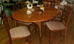 This wood kitchen set is in great condition and includes 2 leafs. Without a leaf the table measures 41 inches diameter so perfect for smaller space then when needed there are 2 leafs that are each 11 inches so it can go up to 63 inches. This set does