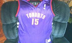 I have a Champion made size 44 NBA jersey bearing the Vince Carter #15 of the Toronto Rapters. In Decent Shape looking for $10 obo