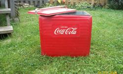 Hello I have a vintage 1940's coca cola cooler. needs a little TLC but is in good condition for being how old it is. i am moving and there is no need for it. $125 firm.