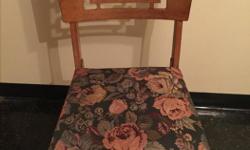 Antique wood chair with upholtered seat. Very good condition.