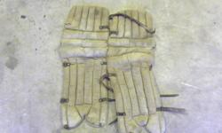 Old set of goalie pads and arm pads, pretty good condition for the year of them, dont really know the age but thinking around the 1950s.  Asking $100 or best offer or trade, be great for your sports bar or man cave  to hang up, hard to beleive they were