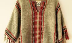 This Artist from the 70's is famous and this is hand crafted.
Hand loomed / handwoven virgin wool sweater ~ Tunic from the 1970's
By : Maria Svatina
Maria Svatina was born in Slovenia. Yugoslavia. Studied in Yugoslavia and Montreal; attended numerous
