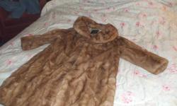 This was my mothers coat. I have never worn it, and would rather it went to someone who would appreciate it...It was bought in ptbo approx 35 yrs ago. 500 obo