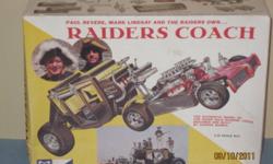 Vintage MPC Model Kit - Raiders Coach plastic kit, 1/25 scale replica show car designed by the legendary custom car builder George Barris. This kit is complete with all parts, decals, instructions and the 4 figures.