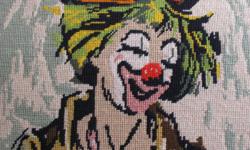 Amazing, large framed needlepoint of a circus clown playing a hand accordion. Hours and hours of work went into hand stitching it years ago. The frame is simple, older and marked. A nice piece for decorating baby nursery, child's room, family room or any