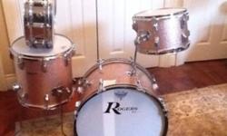 For Sale OBO
Rogers drum kit in Champagne Pearl. Players kit. The 20 and 12 are original Holidays and the 14 is a highend Keller replica.(Couldn't tell eh?) Comes with 10 lug Rogers SuperTen snare in excellent condish. Great sounding drums that you can