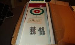 I'm selling my Vintage White Rose Curling Game. This rare item comes with all (16) little magnet curling rocks and magnetic scoreboard with magnet numbers to score the game and instruction booklet of how to play the game. It would date it back early 50's