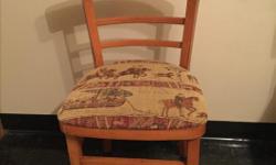 Vintage wood chair with upholstered seat.