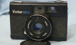 Good working Vivitar 35 CA range finder camera for sell.everything working perfectly.
The Vivitar 35CA is a compact 35mm viewfinder camera marketed by Ponder & Best (later Vivitar) in the 1970s. The camera has a 4 element 38mm f/2.7 lens. The camera also