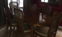 (crafted in Napanee, Ontario)
10 pieces include
Table is oval and includes 2 leaves.
Excluding the leaves, the table measurements are : 54" W x 38"D x 30" H.
Each leaf is 12 " W, for a total table width of 78" W
6 dining chairs
Buffet or serving cabinet :