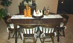 Walnut Dining Table and Six Chairs
In Good Condition!
 
Matching Cabinet for $100.00, will sell separately or as a set!