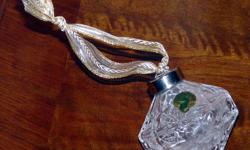 Perfect condition, with Waterford label and etched 1997. 
3" heavy brilliant Irish crystal.