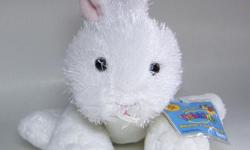 Cute as a cottonball Webkinz white rabbit # HM078. Black beady eyes and pink lined ears. Pink stitched nose and mouth, white whiskers. Sealed code.