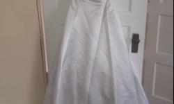 Wedding dress for sale, paid over 1000$ just want to see it go, dress is 2 pieces strapless dress and second pc is pic 3,4,&5 is a short sleeve jacket that goes over the dress, the train is on the jacket, so after ceremony u don't have to bustle up the