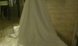 Size 6 or 8. Beautiful gown. Perfect condition. It has a gorgeous detachable train. It has been dry cleaned. Also available a winter cloak. Come and try it on!
This ad was posted with the Kijiji Classifieds app.