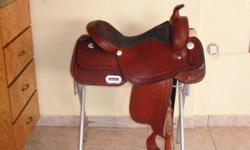 Western saddle, Griffith 9607, 16" seat, only used twice.  Purchased from Pleasant Ridge Saddlery in Brantford for $599.00 on sale.