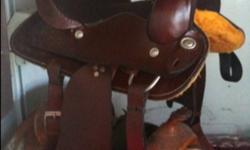 All western saddles.....range from 400.00 to 600.00
And 15" seats and one 16" seat
Good all Around saddles
In order with pics and prices!!!
1. 400.00 dark brown/little bit of tooling, 15"
2. 450.00 dark brown/stitching on seat/some tooling, 15"
3. 500.00