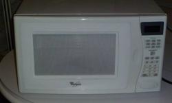 whirlpool microwave for sale - 11 years old  -used very rarely
very clean and in great working order
dimensions 21"wide x 15 1/4" deep x 12 1/2 " high