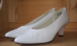 Ladies white high heel shoe. Size 8 1/2. No marks on sole,like brand new. Only worn for one day at my wedding.Very comfortable to wear all day.Paid $50 new,asking $10. I can deliver to the Grande Prairie area.