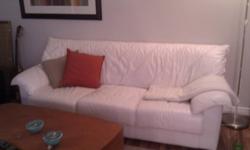 Modern white leather couch. In good condition, very comfortable, great for a student. Non-smoking household.