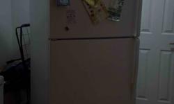 Fridge is 3yrs old and in perfect working condition. Several adjustable shelves, top freezer and flat back with no exposed coils. Dimensions With doors and hinges 66" (h) 29 3/4" (w) 29" (d); without doors and hinges 65 1/4 29 3/4" (w) 27" (d)