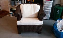 Brown wicker chair with cushions - was kept inside the house in the office so rarely used and in very good condition. Approximately 36" wide x 32" deep