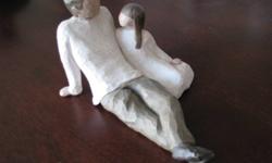 2 Willow Tree collectibles. Large father /daughter $15.00, other one boy with a golden heart $8.00